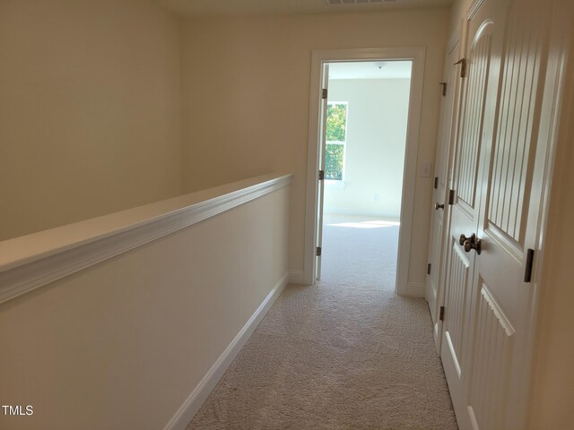 3616 Tarmac Rd Unit Ep 129, Wilson, NC 27896 - corridor with light carpet and baseboards