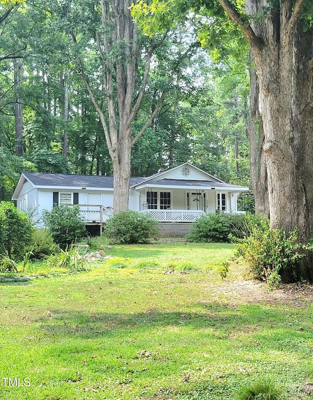 325 Ranch Farm Rd Unit A B, Raleigh, NC 27603 - ranch-style home with a front yard and a porch
