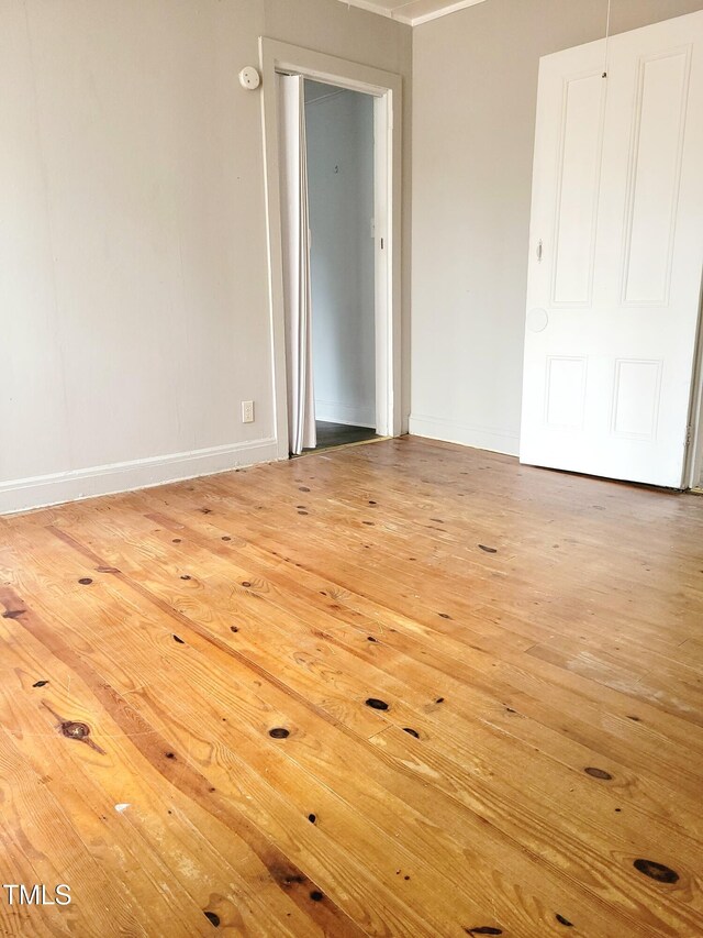 325 Ranch Farm Rd Unit A B, Raleigh, NC 27603 - unfurnished bedroom with baseboards and light wood-style flooring
