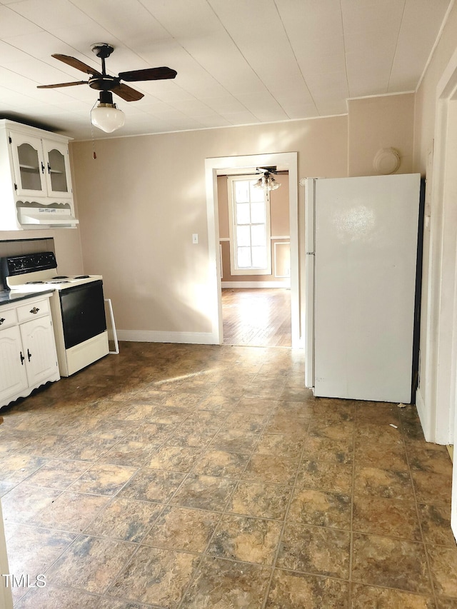 kitchen with white cabinetry, ceiling fan, and white appliances