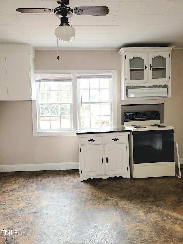 325 Ranch Farm Rd Unit A B, Raleigh, NC 27603 - kitchen with electric stove, healthy amount of natural light, ceiling fan, and white cabinetry