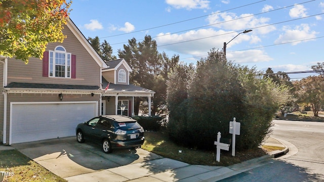 view of front of property featuring a garage