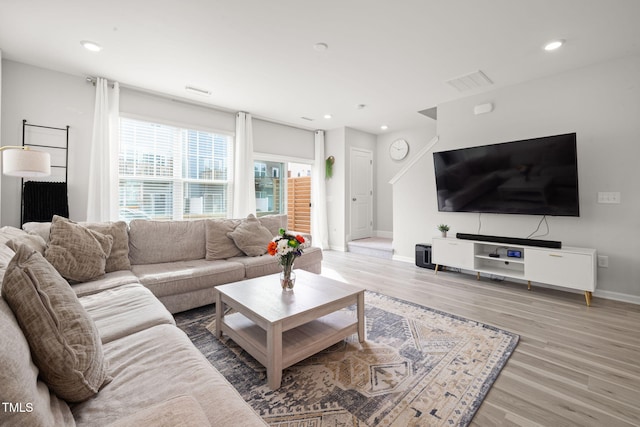 living room with hardwood / wood-style flooring