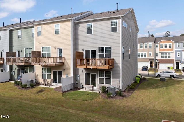 back of property featuring a patio, a lawn, and cooling unit