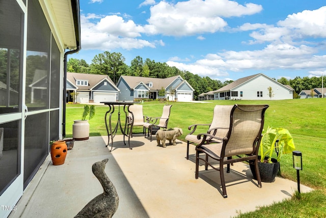 view of patio featuring a garage