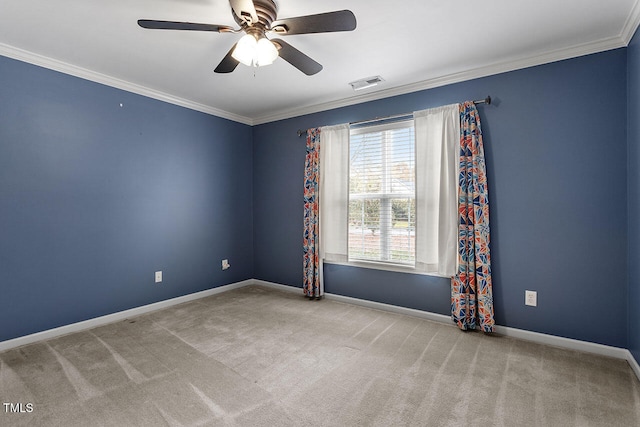 unfurnished room featuring light carpet, ceiling fan, and crown molding