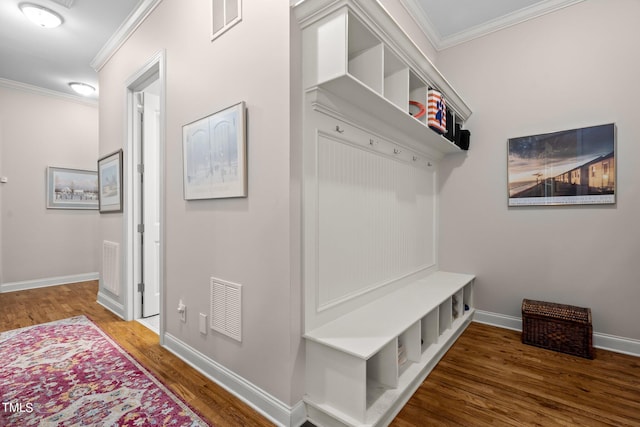 mudroom with crown molding and dark hardwood / wood-style flooring