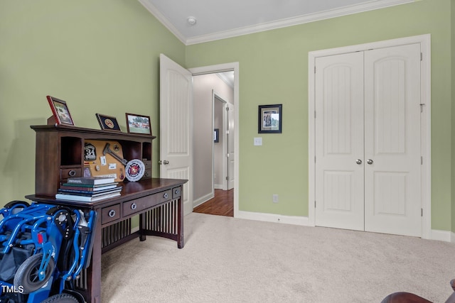 carpeted office space with crown molding