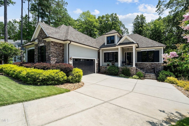 craftsman-style home featuring a garage