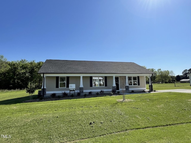 108 Pate Landing Dr, Selma, NC 27576 - view of front of home with roof with shingles and a front lawn