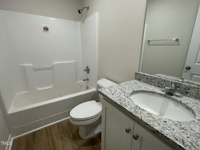 108 Pate Landing Dr, Selma, NC 27576 - full bathroom featuring toilet, wood finished floors, vanity, and bathtub / shower combination