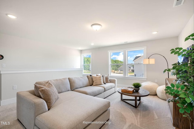 living room with visible vents, recessed lighting, baseboards, and carpet floors