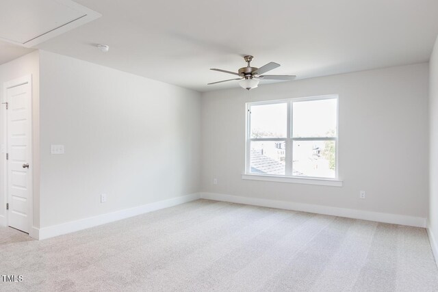240 Fast Pitch Ln, Four Oaks, NC 27524 - unfurnished room featuring attic access, light colored carpet, a ceiling fan, baseboards, and a smoke detector