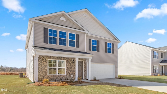 view of front of house with cooling unit, a front lawn, and a garage