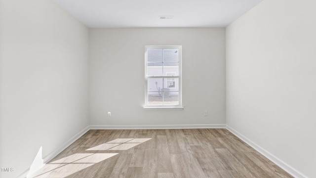 empty room featuring light wood-type flooring