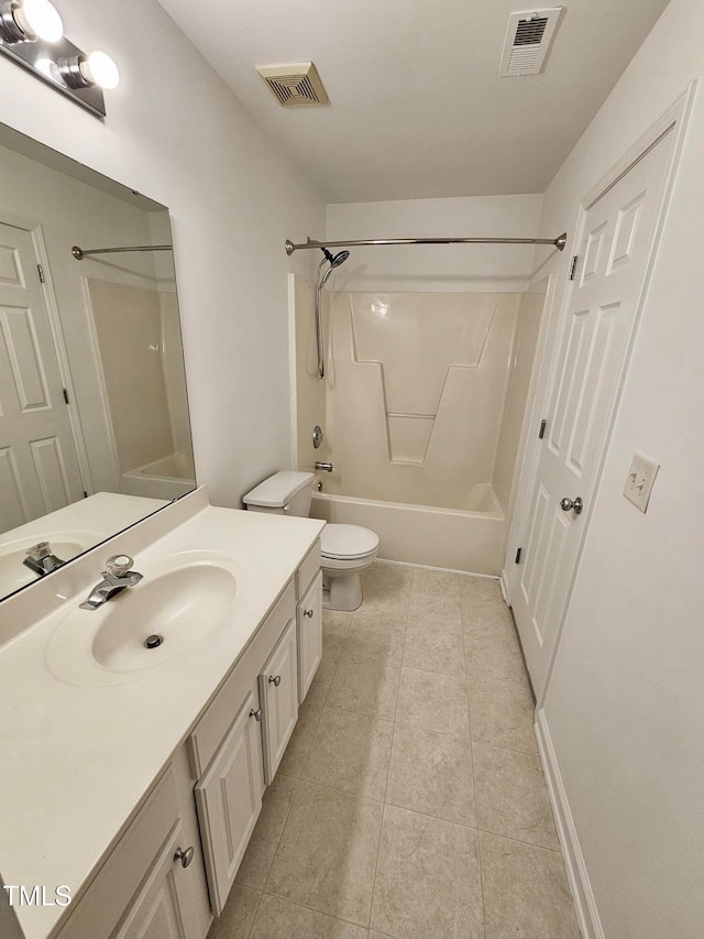 full bathroom with tile patterned floors, toilet, vanity, and tub / shower combination