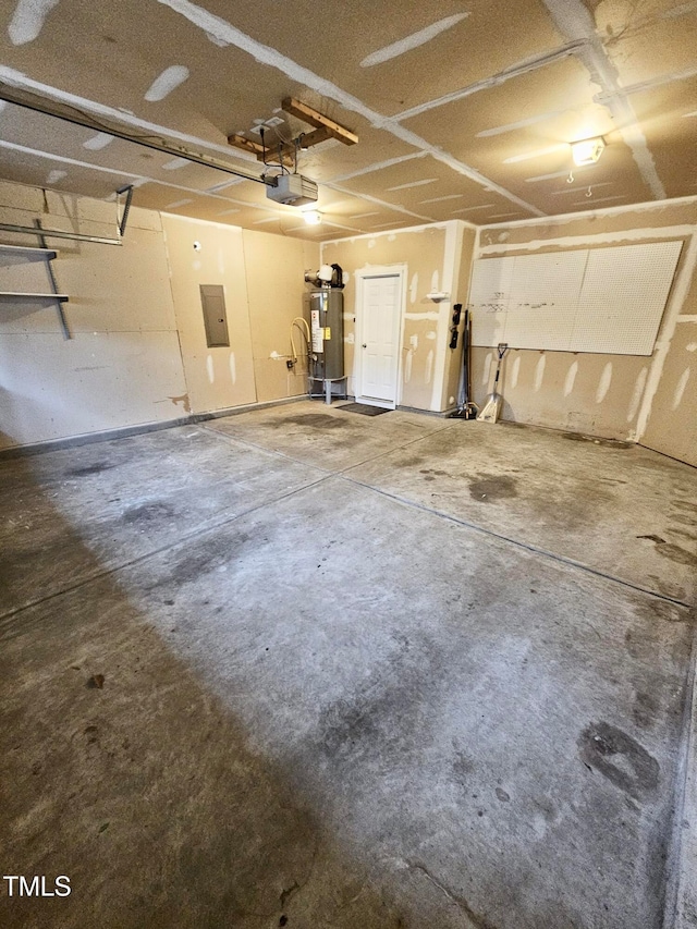 garage featuring electric panel, a garage door opener, and water heater