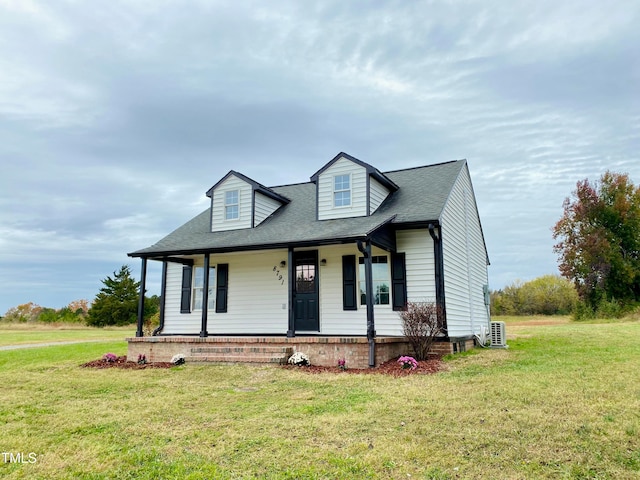 view of front facade featuring a porch and a front yard