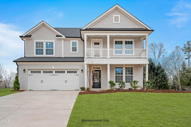 view of front facade featuring a front yard, a garage, and covered porch