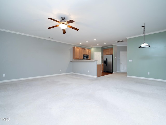 unfurnished living room with light colored carpet, ceiling fan, and ornamental molding