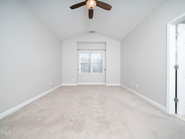 interior space featuring ceiling fan and lofted ceiling