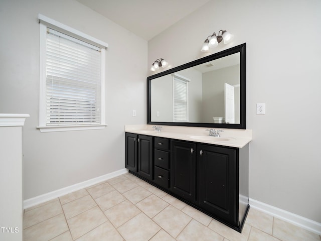 bathroom with vanity and tile patterned floors