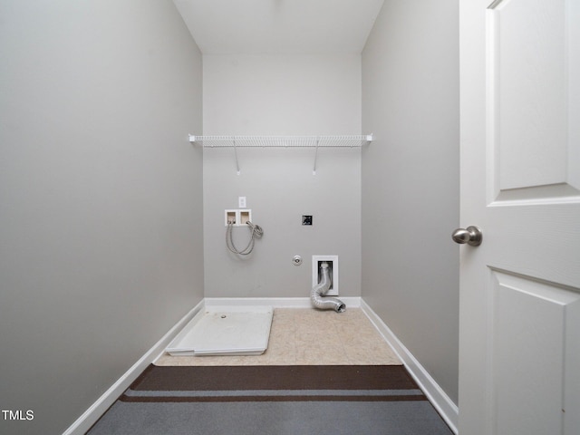 clothes washing area with hookup for an electric dryer, hookup for a gas dryer, and washer hookup