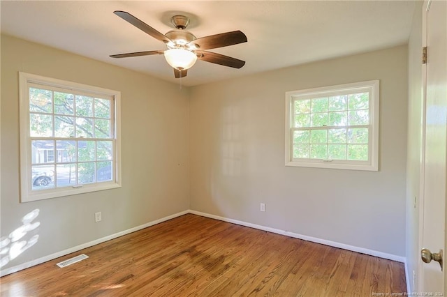 unfurnished room featuring wood-type flooring and ceiling fan