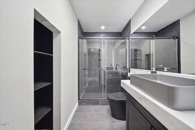 bathroom with walk in shower, tile patterned flooring, vanity, and toilet