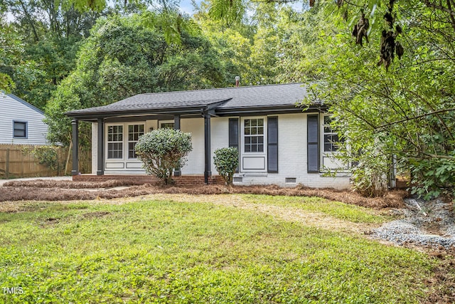 ranch-style house with a front yard