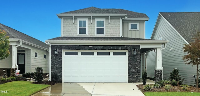 view of front of property with a garage