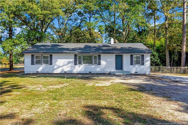 single story home with a front yard