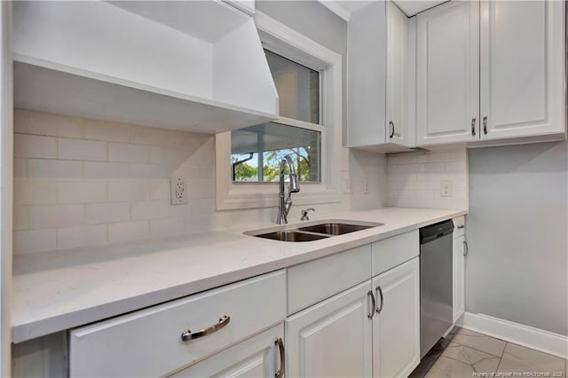 kitchen with white cabinetry, stainless steel dishwasher, tasteful backsplash, and sink