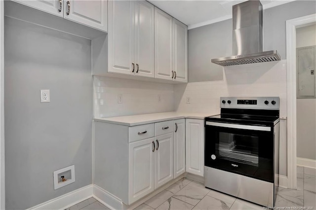 kitchen featuring stainless steel range with electric stovetop, white cabinets, wall chimney range hood, and tasteful backsplash