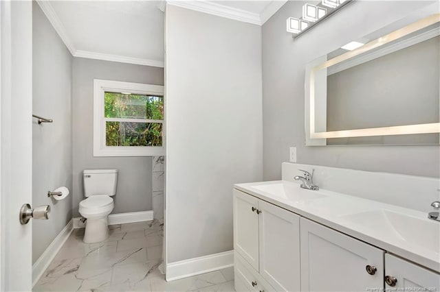 bathroom featuring vanity, toilet, and ornamental molding