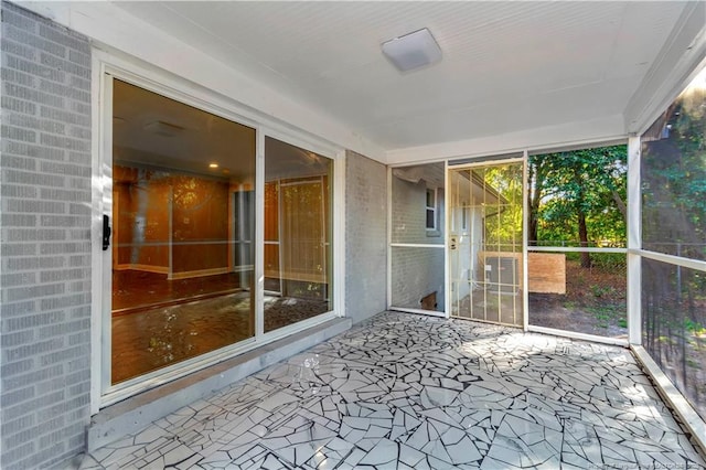 view of unfurnished sunroom