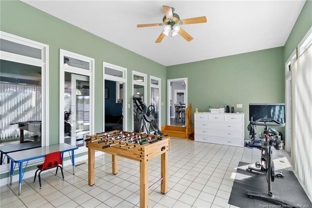 rec room featuring ceiling fan and light tile patterned floors