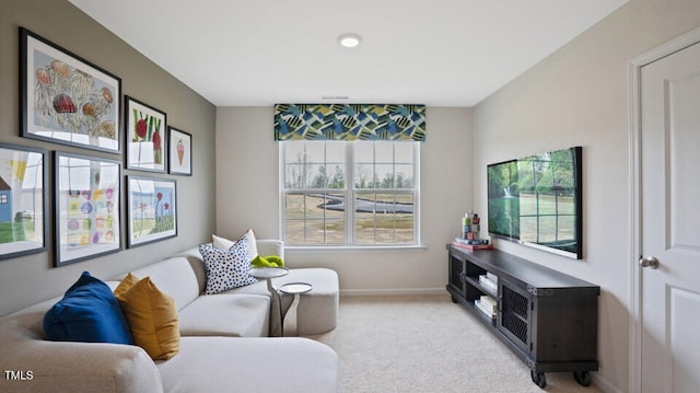 sitting room with light carpet and a wealth of natural light