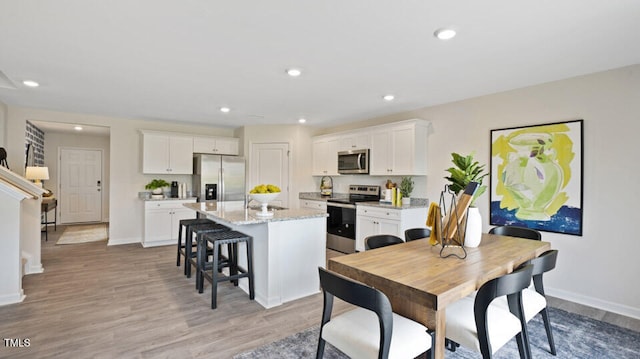 dining area featuring light hardwood / wood-style floors