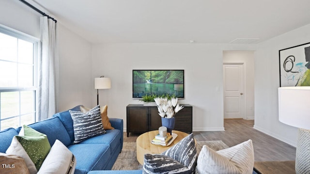 living room with light hardwood / wood-style floors