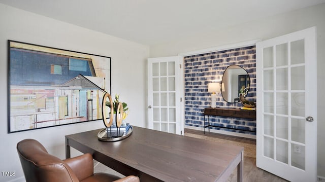 dining area with french doors and wood-type flooring