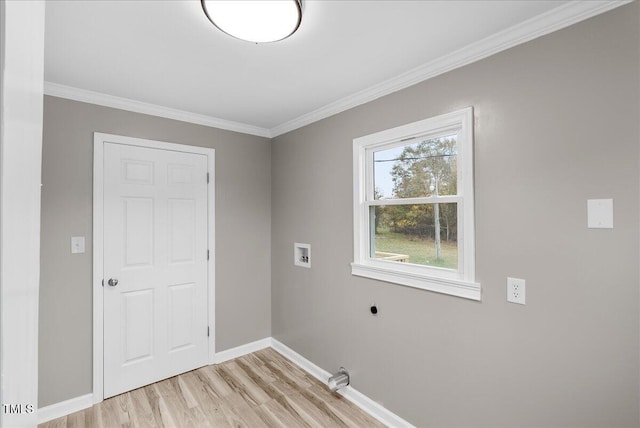 clothes washing area featuring hookup for an electric dryer, light hardwood / wood-style floors, washer hookup, and ornamental molding