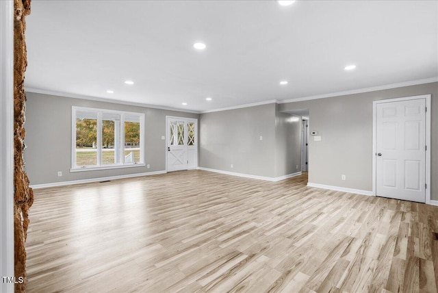 unfurnished living room with light hardwood / wood-style floors and crown molding