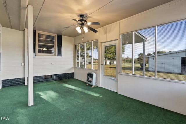 2494 Joel Johnson Rd, Lillington, NC 27546 - unfurnished sunroom with a ceiling fan and heating unit