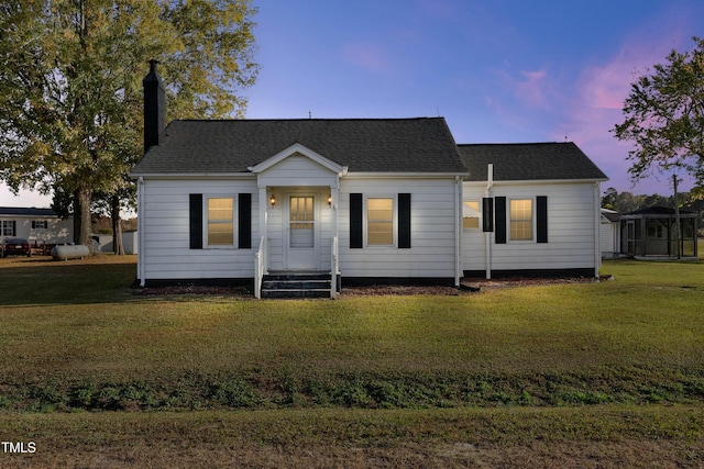 2494 Joel Johnson Rd, Lillington, NC 27546 - view of front of home featuring a chimney and a yard