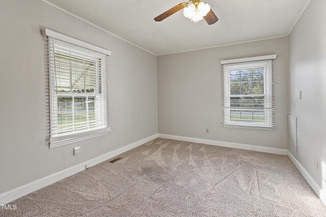 2494 Joel Johnson Rd, Lillington, NC 27546 - unfurnished room featuring carpet, a ceiling fan, and baseboards