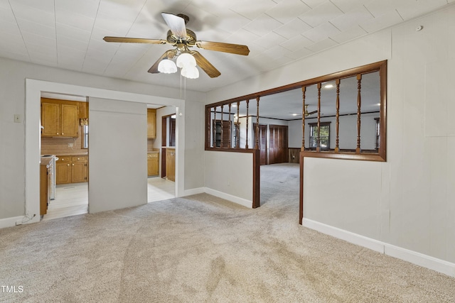 2494 Joel Johnson Rd, Lillington, NC 27546 - empty room featuring light carpet, ceiling fan, and baseboards
