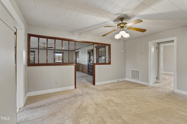 2494 Joel Johnson Rd, Lillington, NC 27546 - carpeted empty room featuring ceiling fan and baseboards