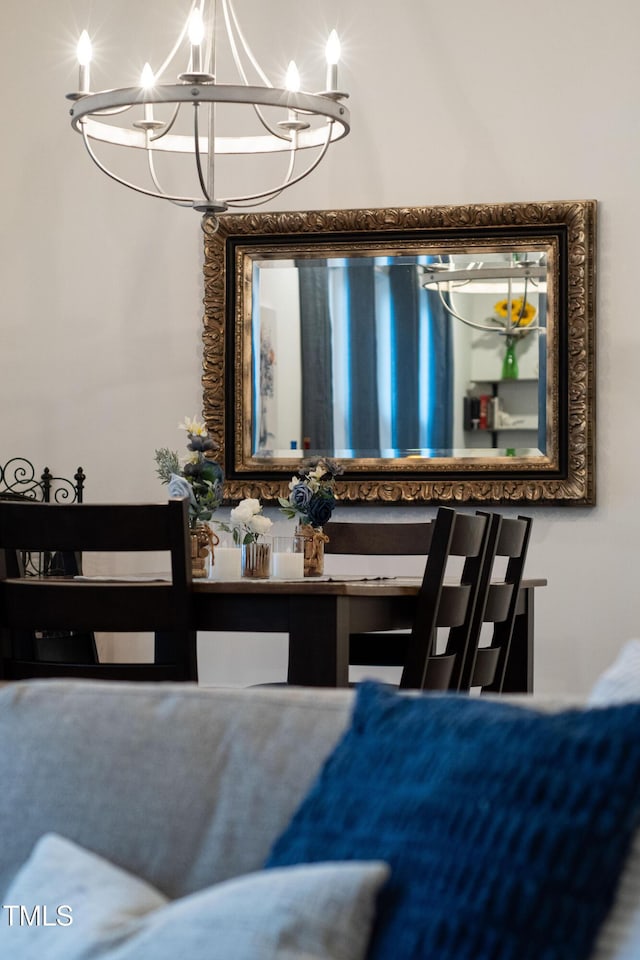 dining space featuring a chandelier