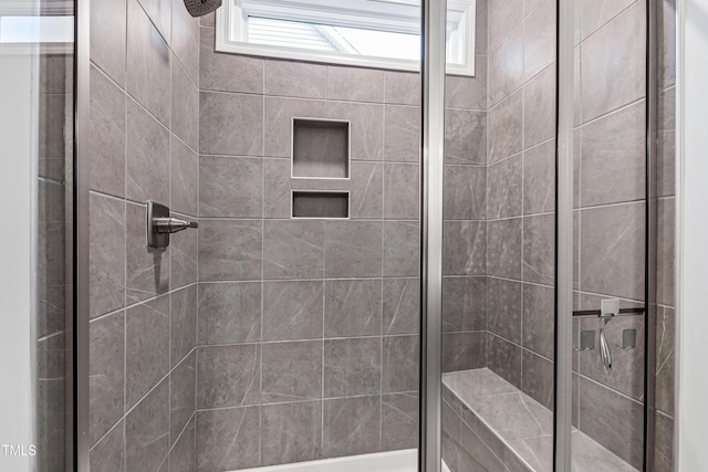 bathroom with a stall shower